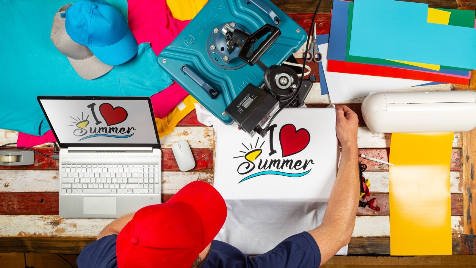 An artist designing and making a t-shirt to represent print-on-demand platforms.