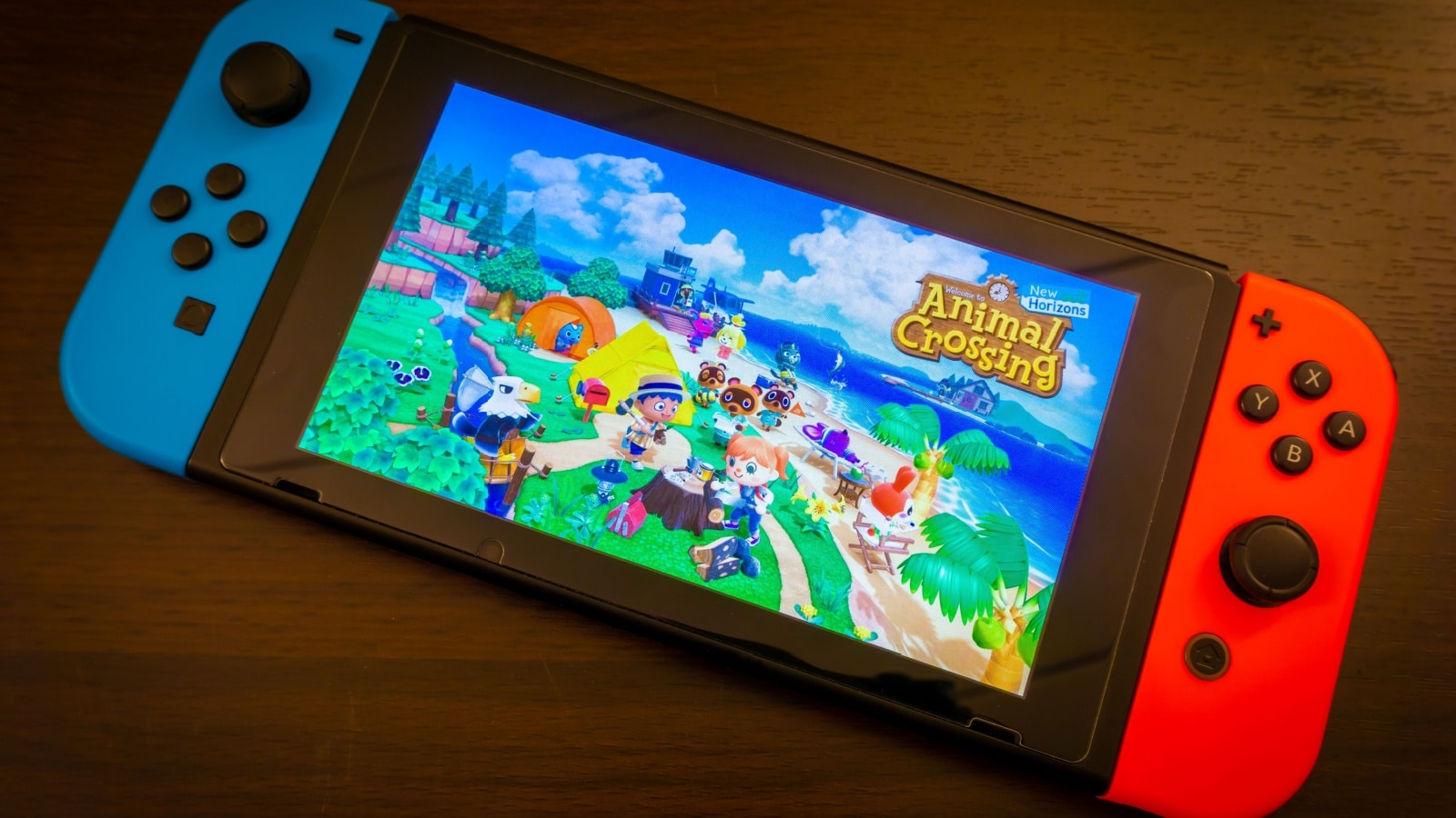 Image of the Animal Crossing New Horizons game on a handheld Nintendo Switch to answer the question is Animal Crossing Educational?