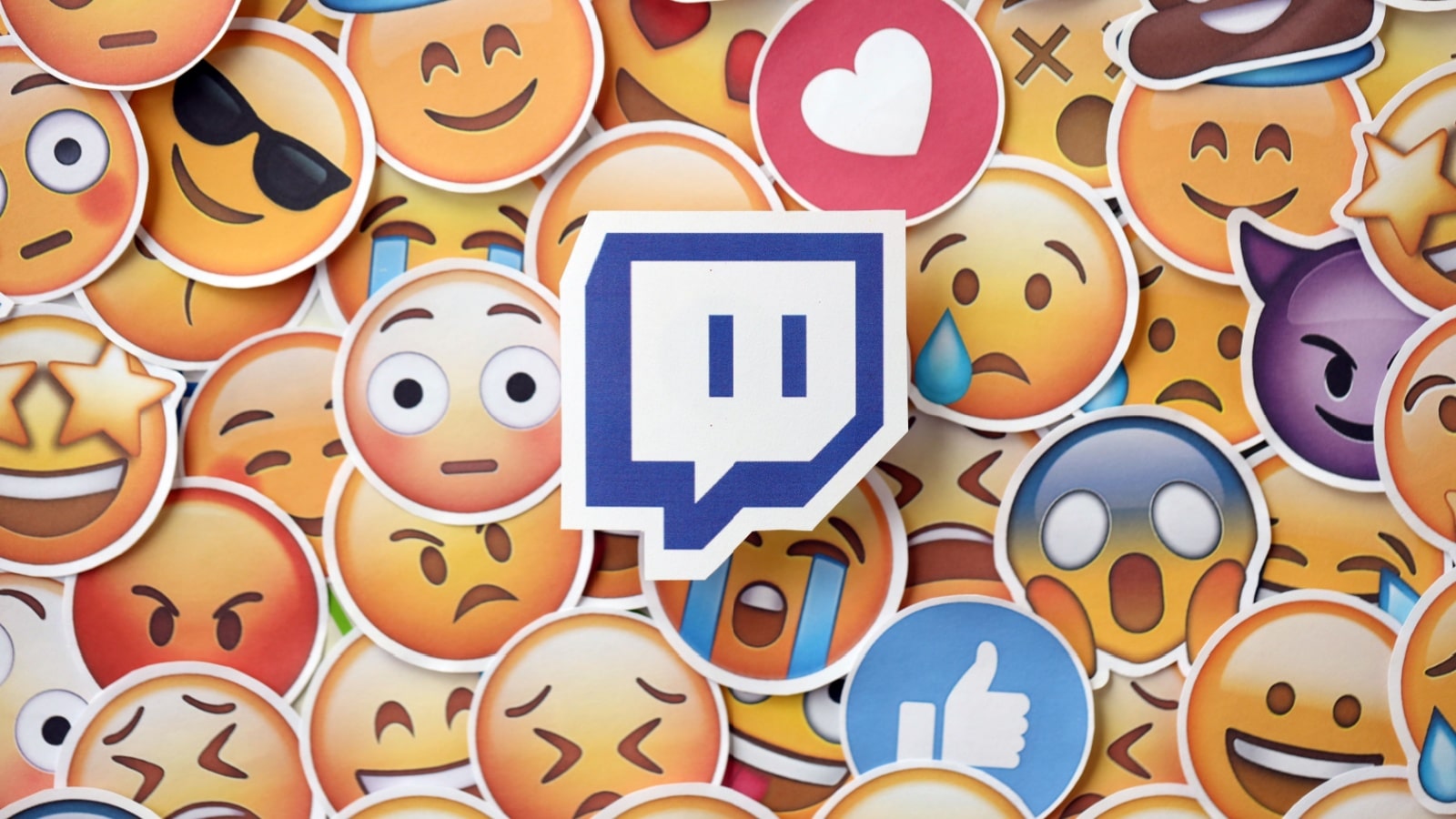The Twitch logo on top of a pile of emoticons to represent Twitch emotes.