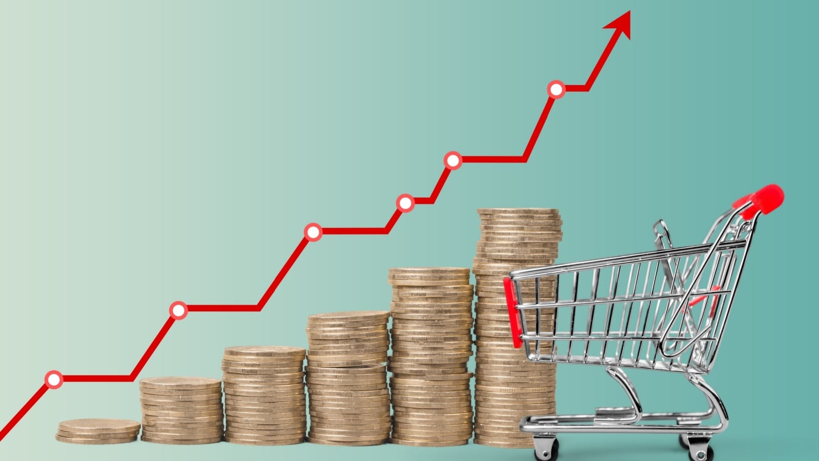 Coins stacked higher and higher with a red arrow pointing up in front of a grocery cart to represent the rising cost of living when we explore historical data from the cost of living in 2020.