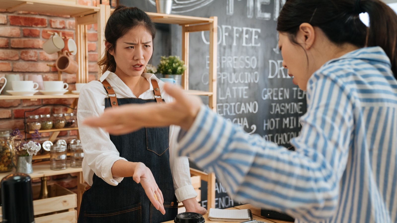 A customer yells at a barista to illustrate how bad service industry jobs are.
