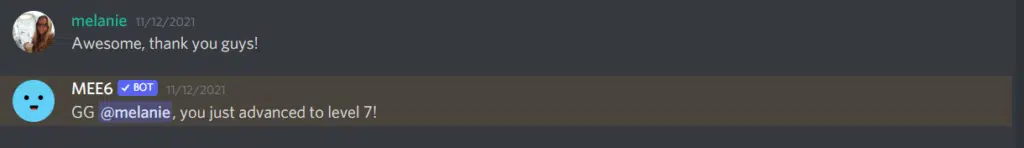 screenshot of MEE6 bot congratulating user on advancing in rank