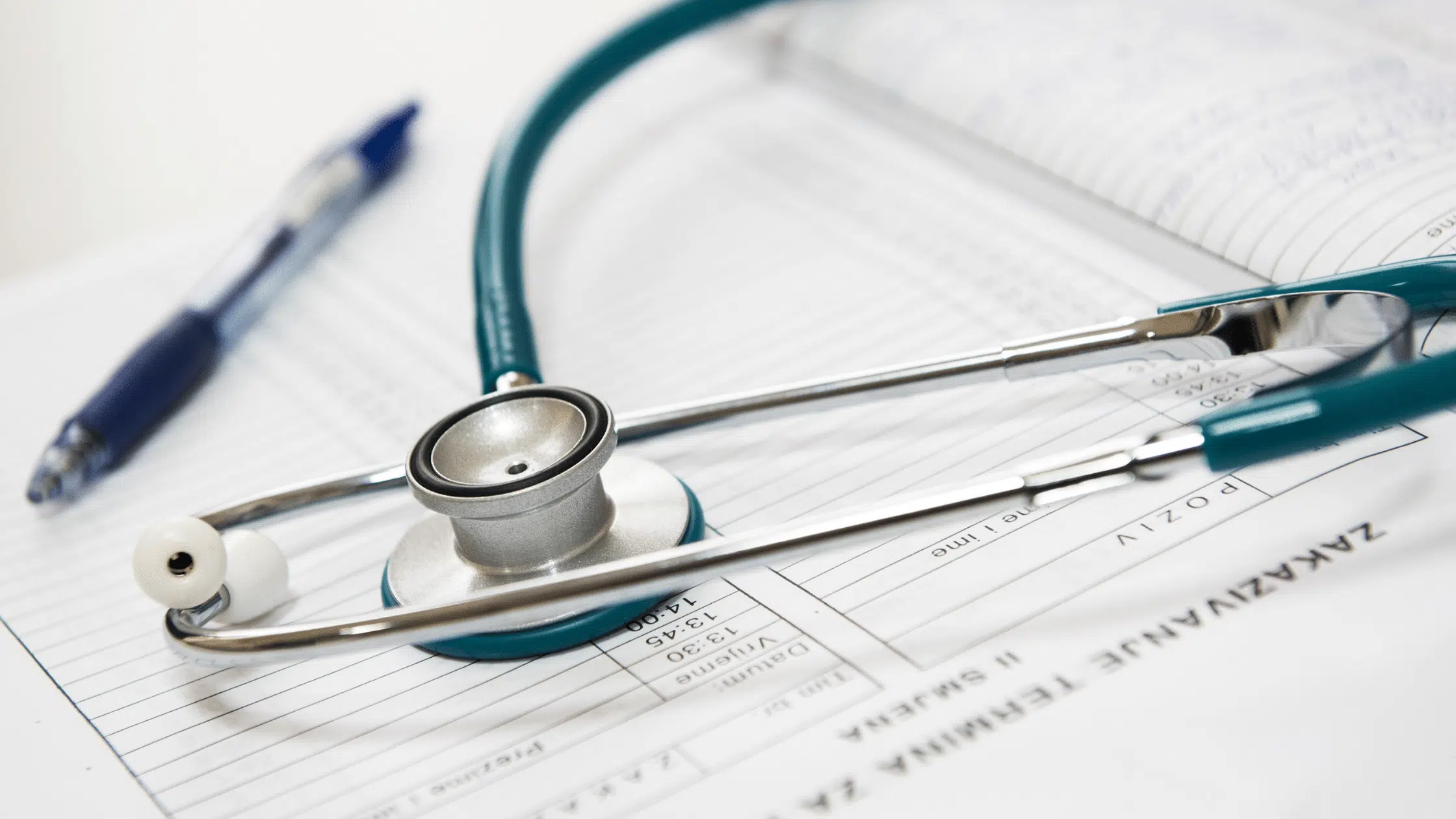 stethoscope on top of paperwork
