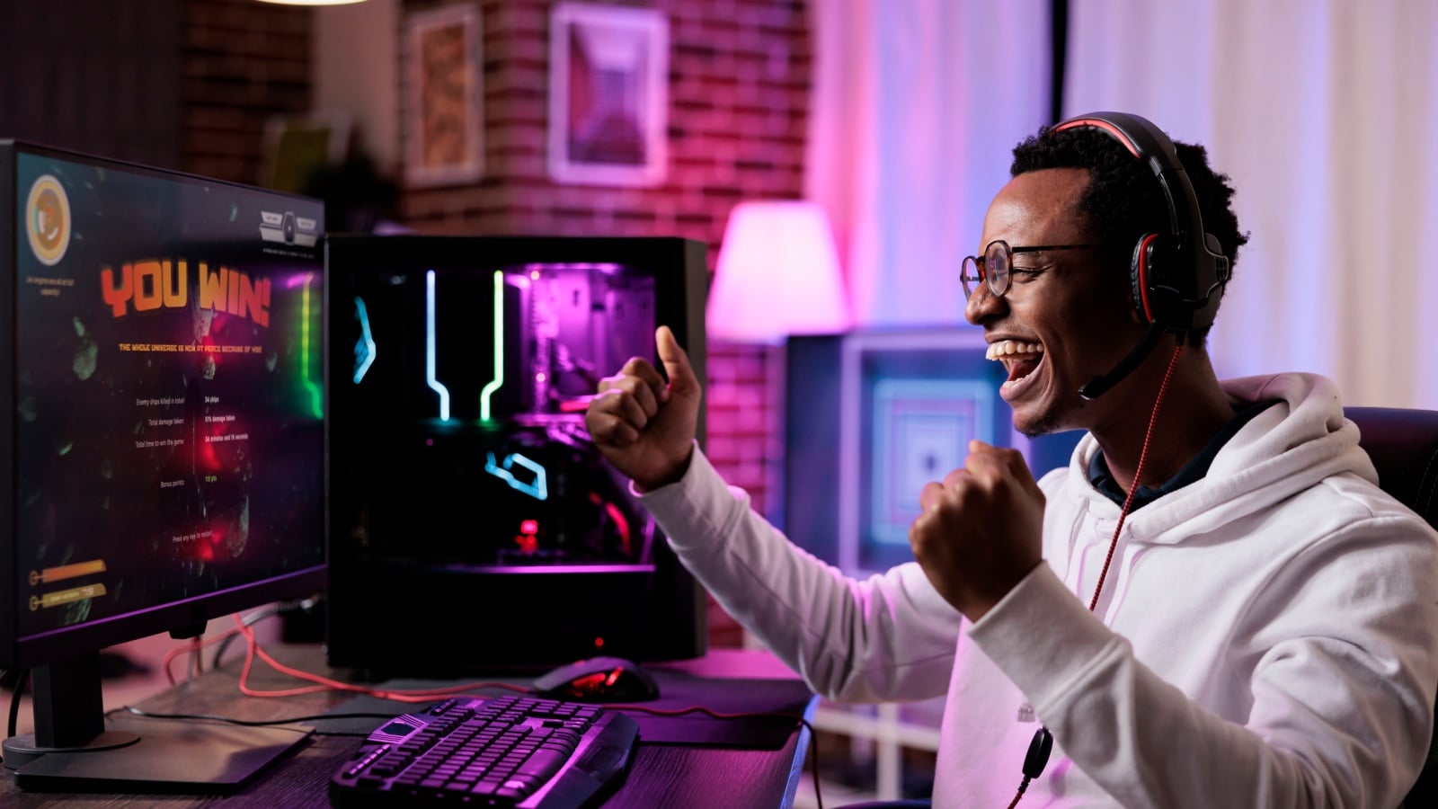 A an excited gamer winning to represent streaming for fun.