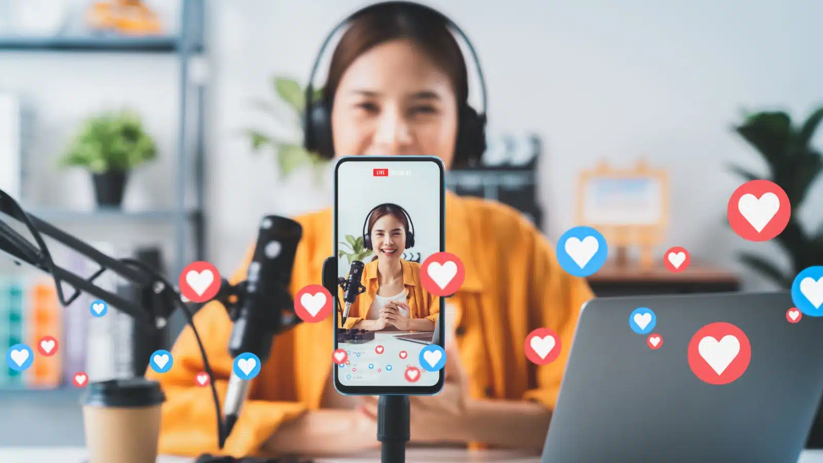 Support content creators by watching and engaging with their content.. A Vlogger records a video.
