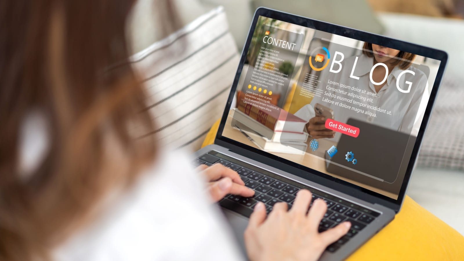 A woman is customizing a blog on her laptop to represent how to start a blog.