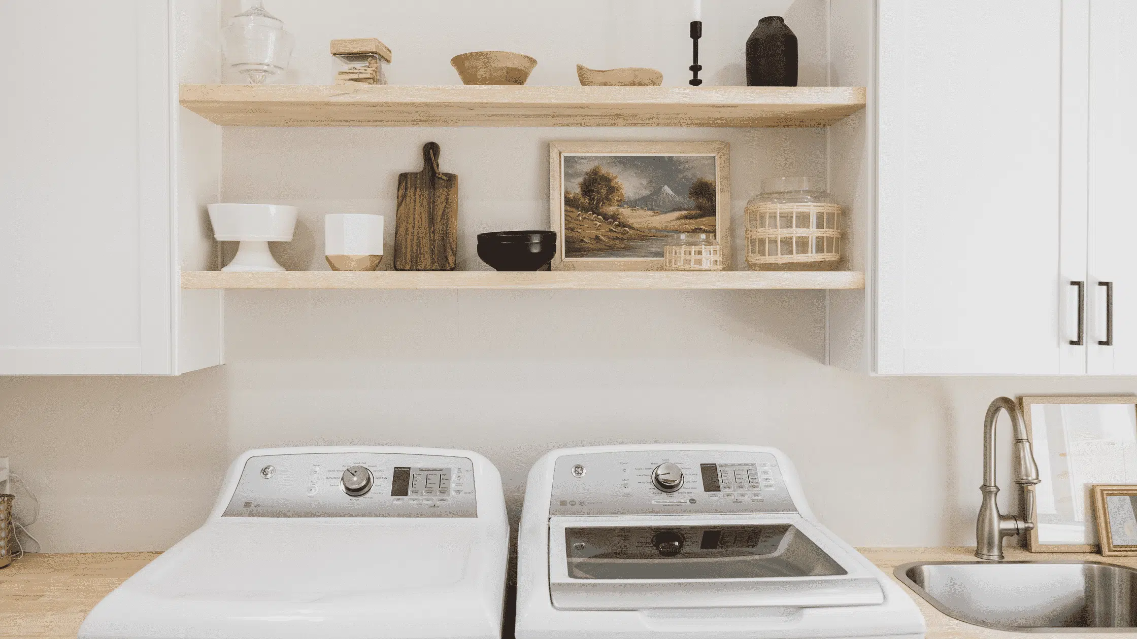picture of washer and dryer with shelves above them to represent laundry detergent