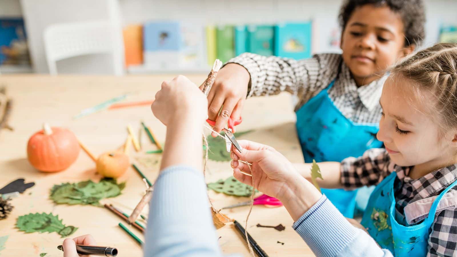 Preschool children making crafts to represent crafts for kids.
