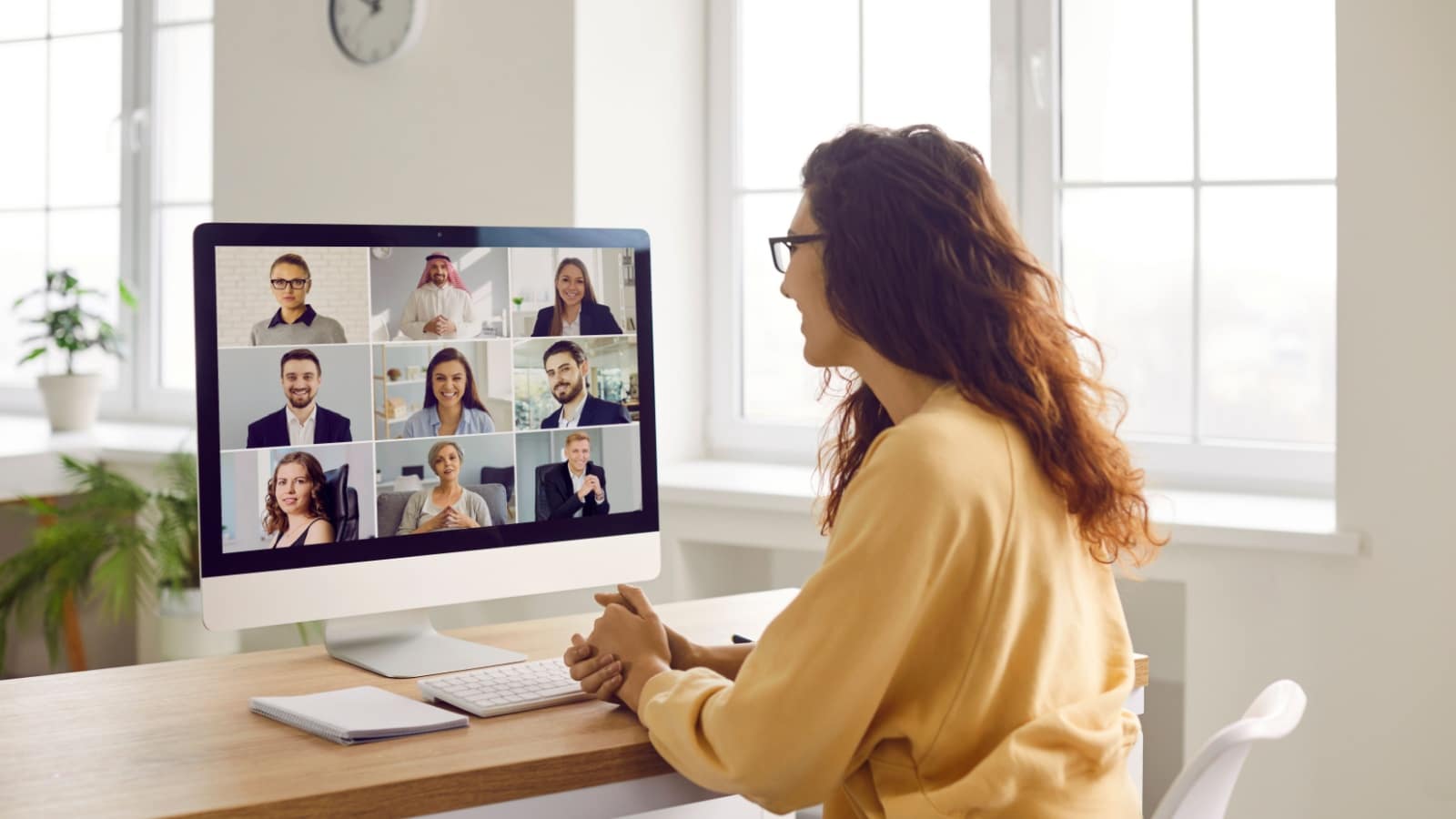 A worker on a virtual business meeting to represent using Discord for business.