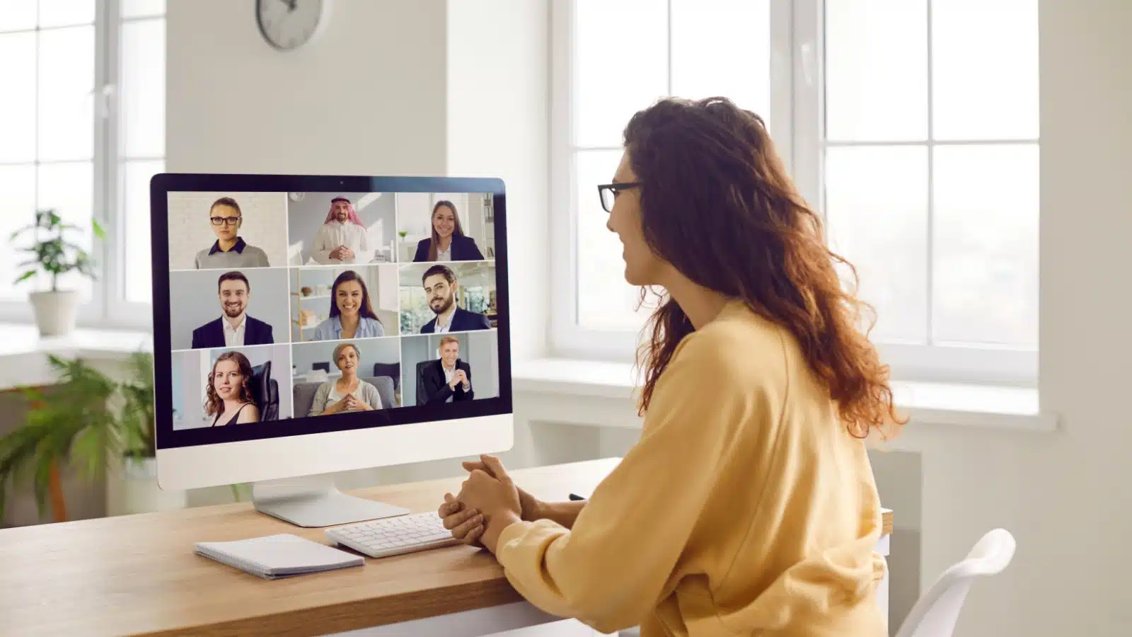 A worker on a virtual business meeting to represent using Discord for business. 
