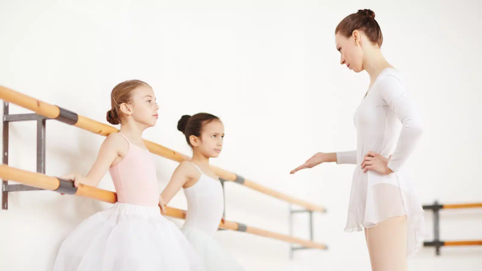 A ballet teacher scolding her young students to do things right the first time. 