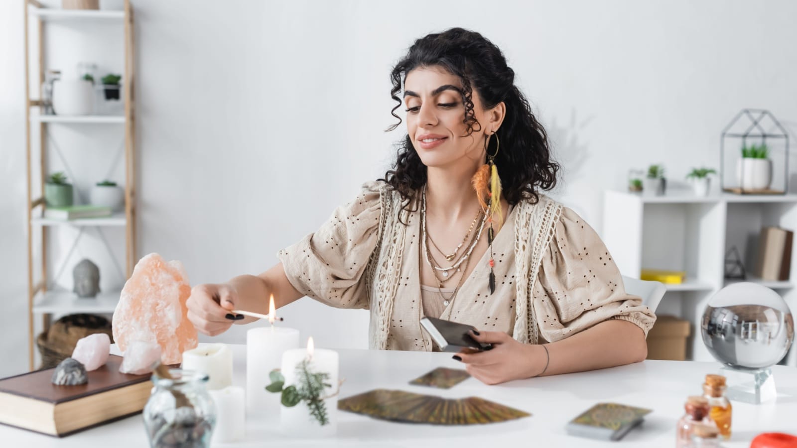 A modern witch performing a ritual to represent how do spells work.