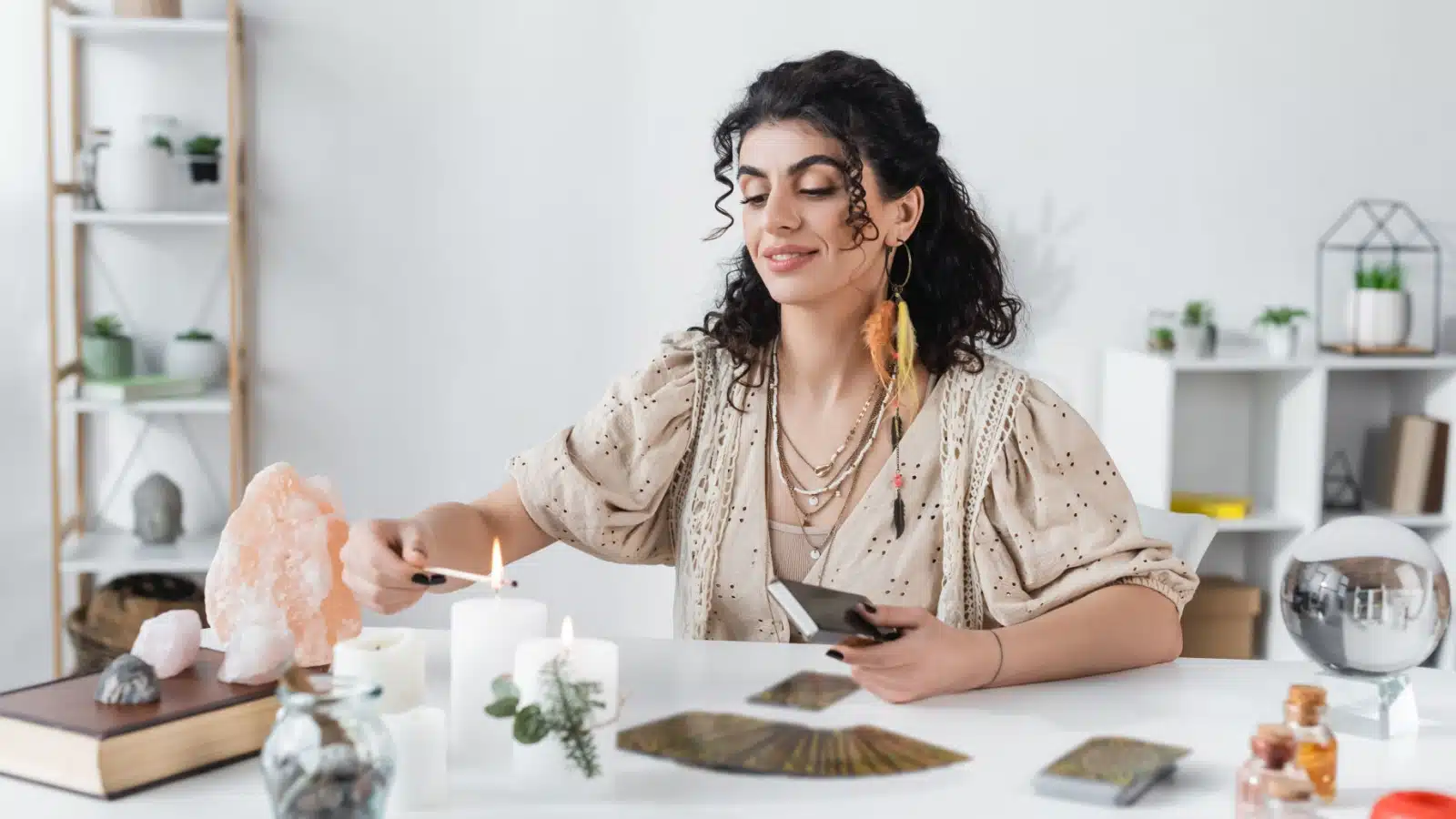 A modern witch performing a ritual to represent how do spells work.