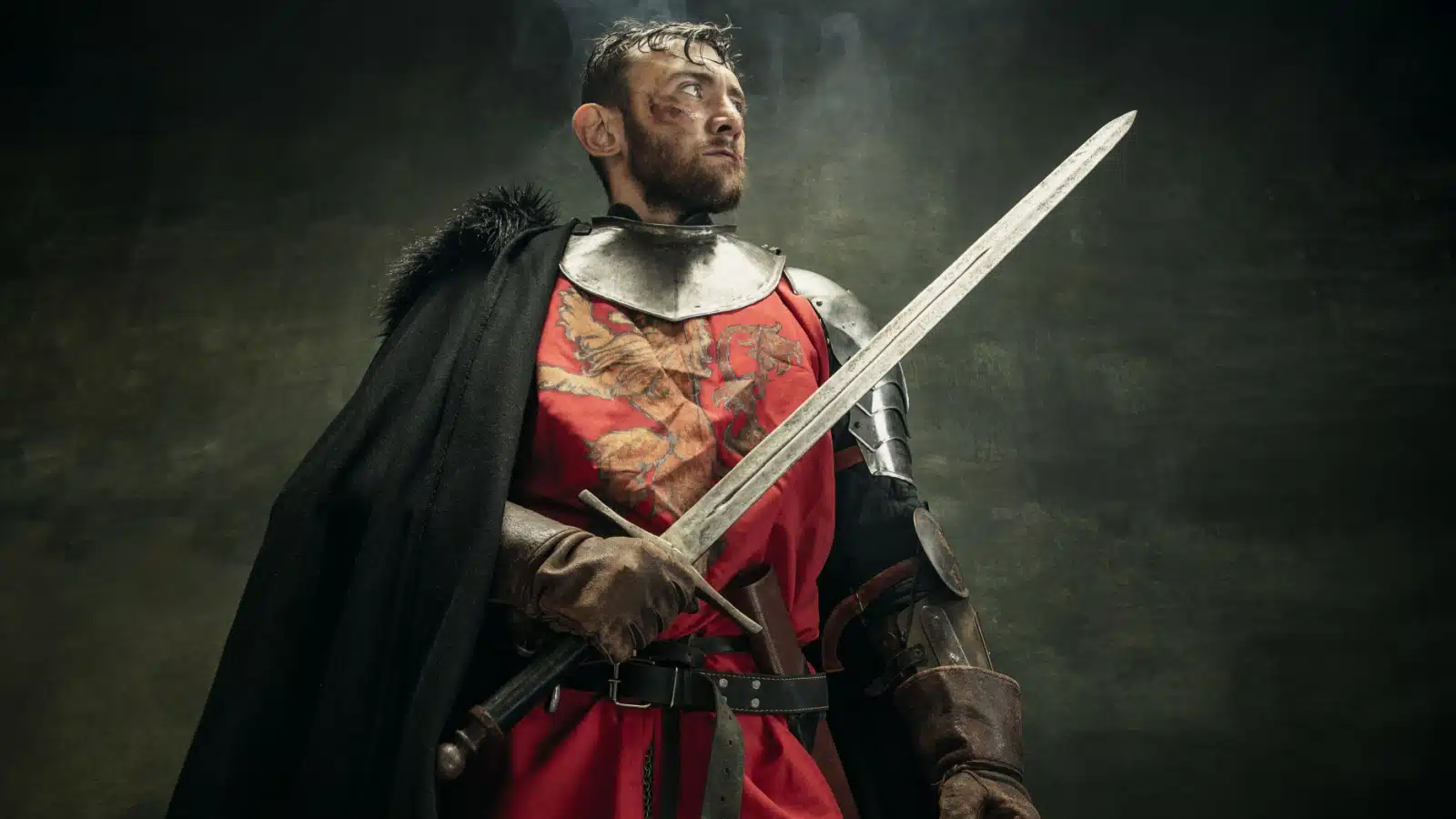 A noble knight stands ready for battle to represent the lawful good character alignment in D&D.