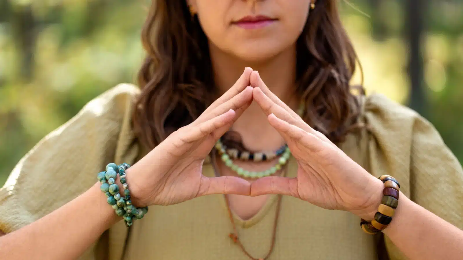 A modern witch focusing her intention while casting a spell.