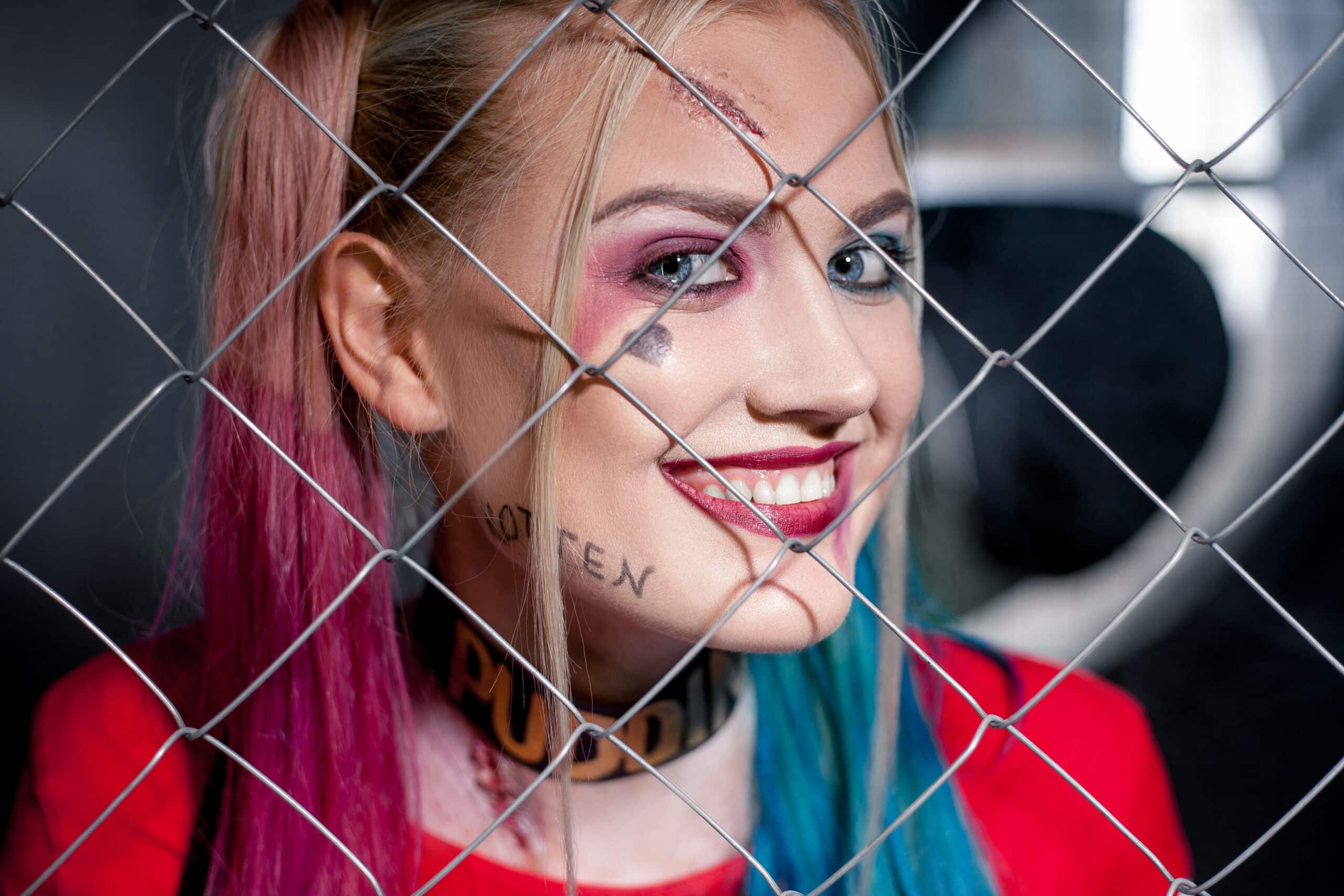 Woman wearing Harley Quinn cosplay to represent chaotic evil