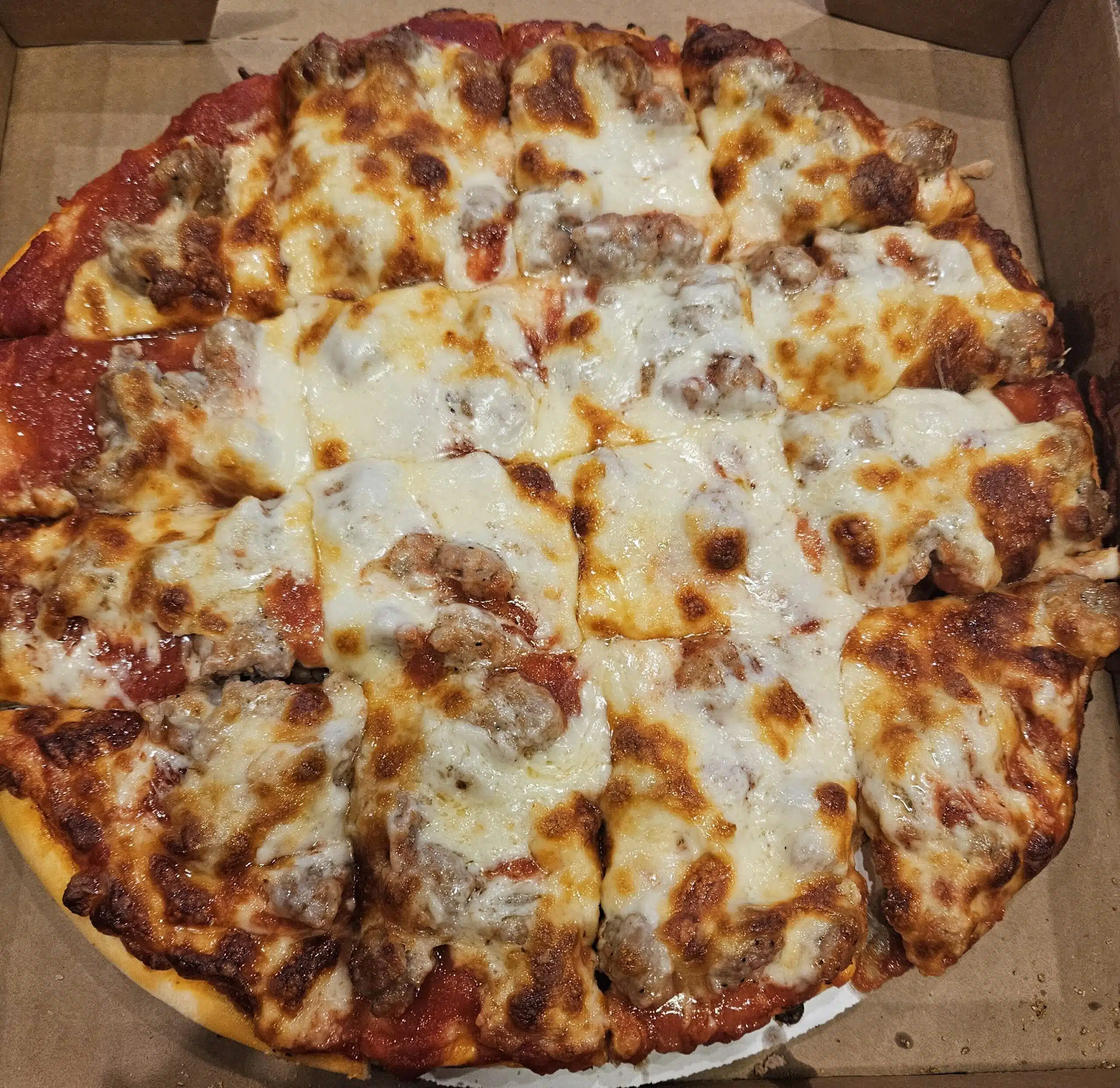 Chicago tavern style sausage pizza from Beggars Pizza.