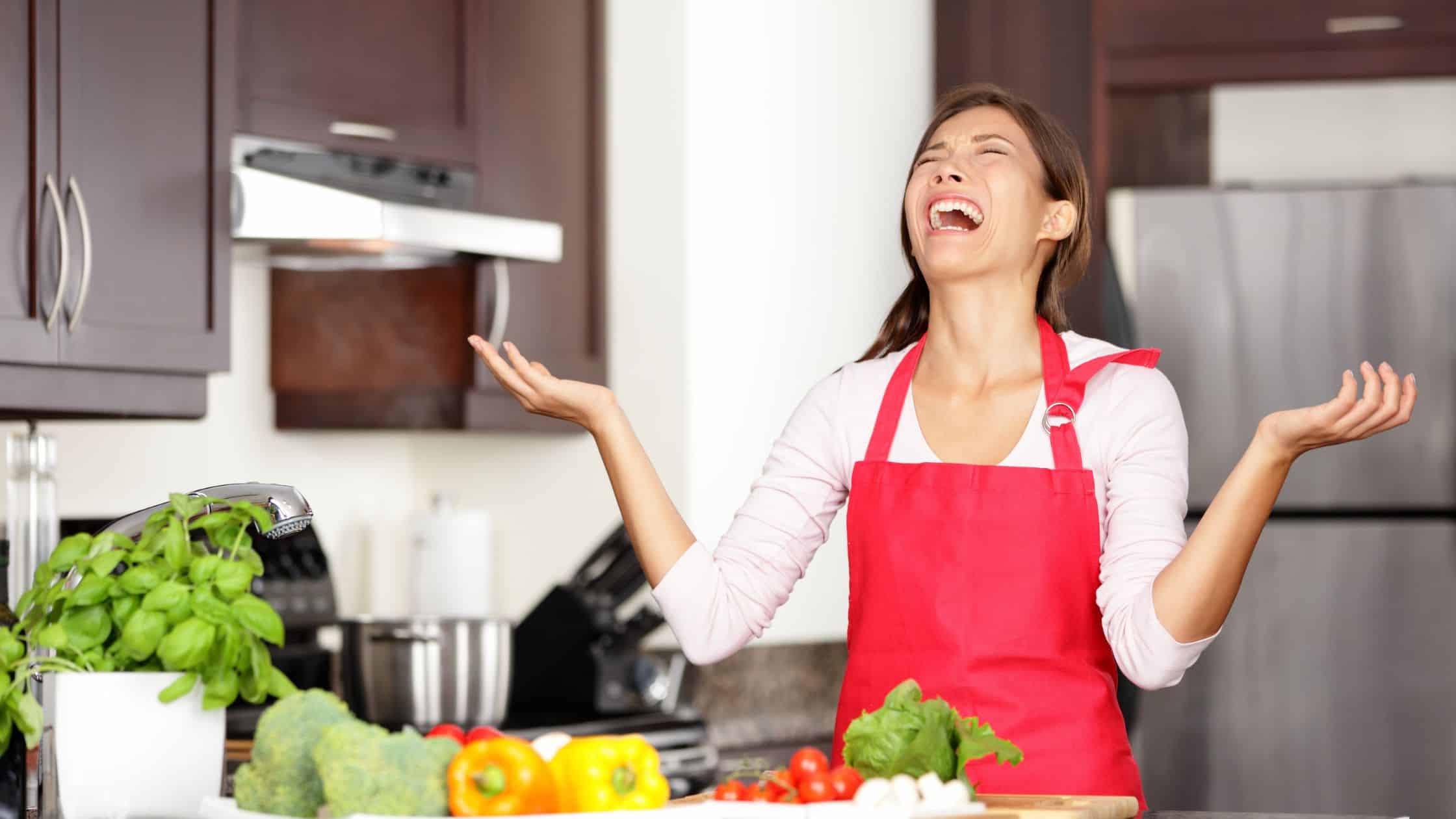 woman upset while cooking