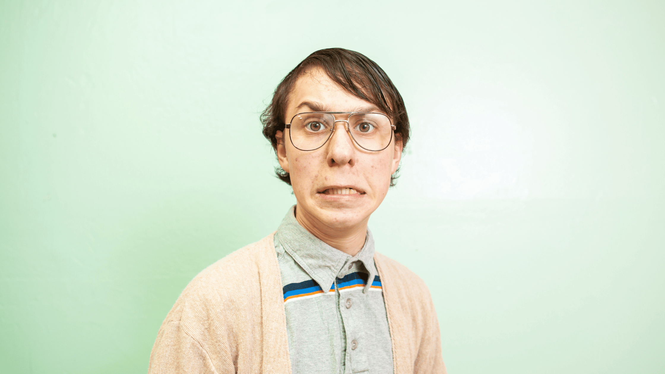 Picture of an awkward man who looks a little nervous to represent strange hobbies