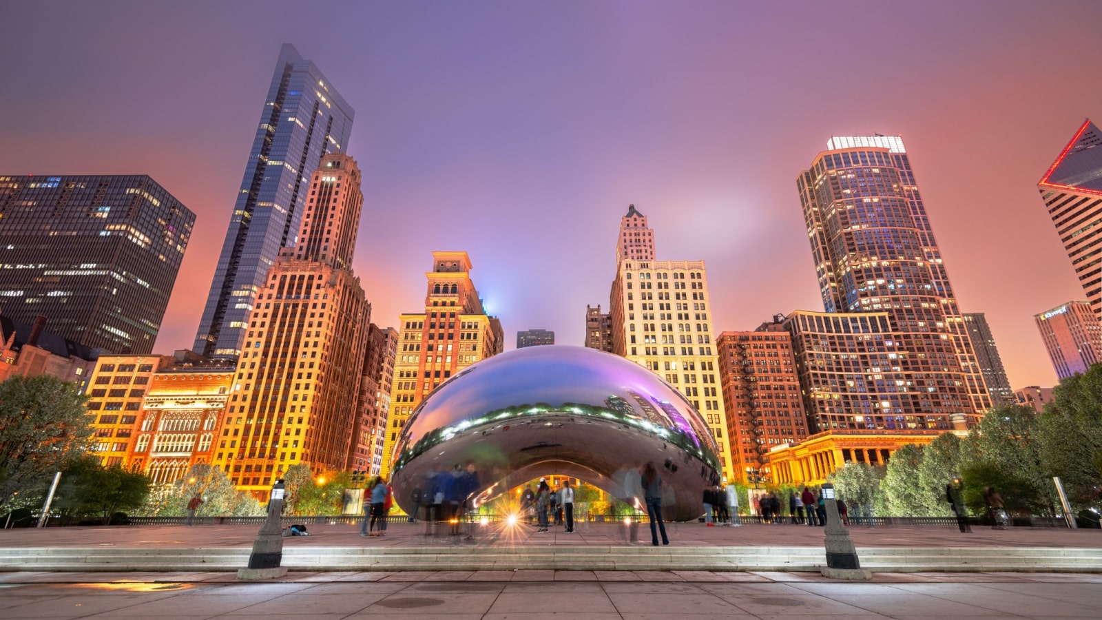 "The bean" at Millenium Park at sunset to represent the best things to do in Chicago, Illinois.