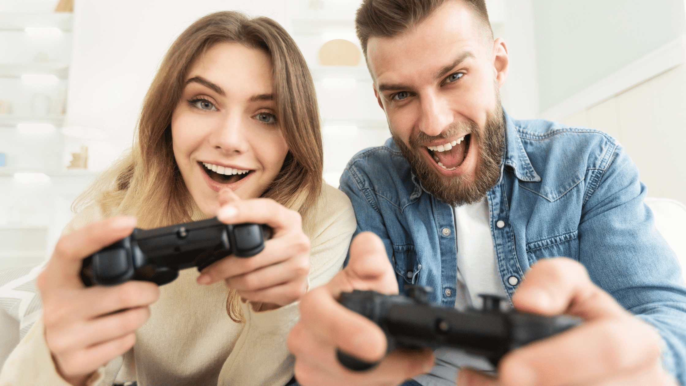 couple happily playing a video game to represent best video games of all time