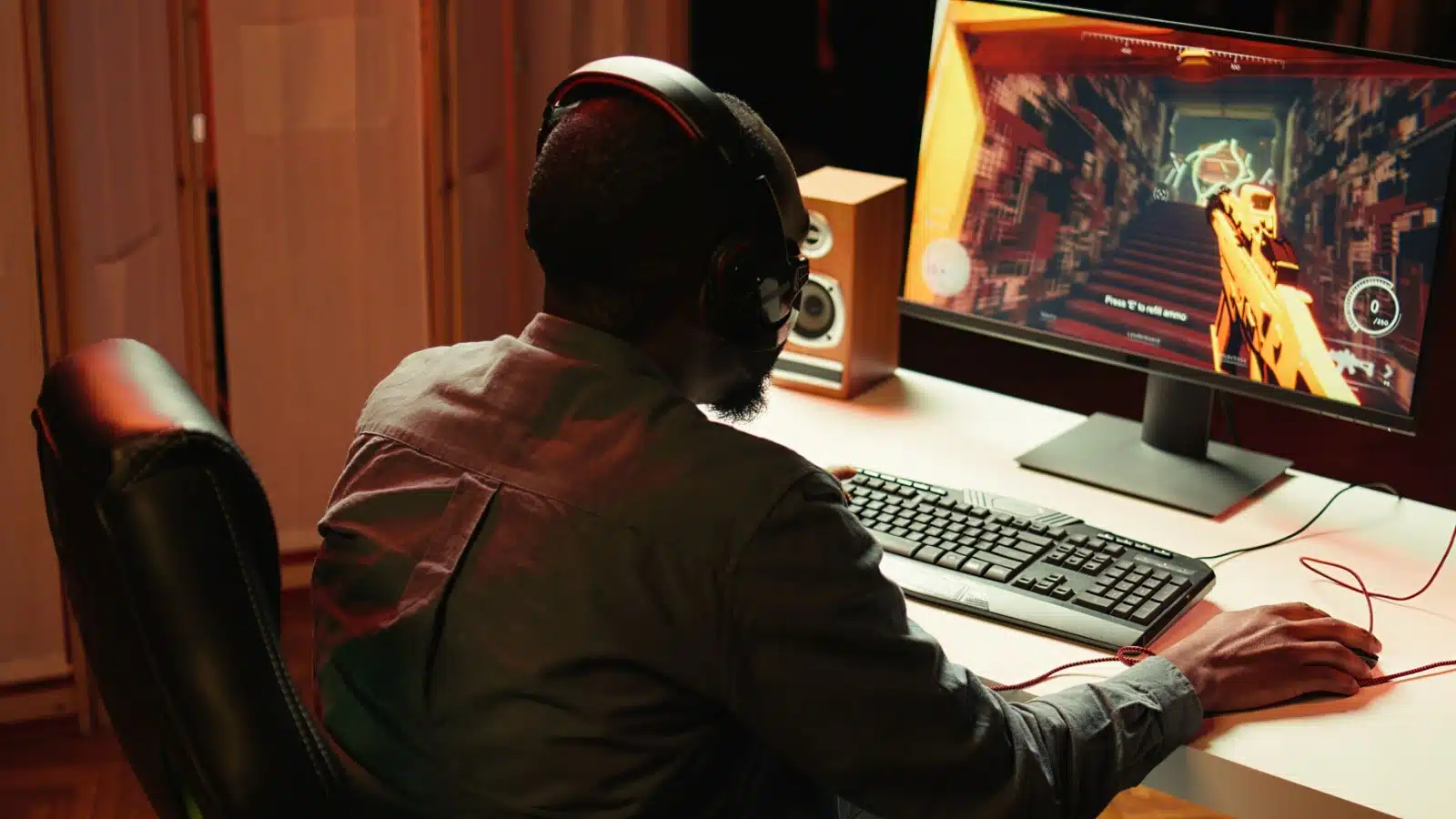 A man plays a first person shooter game to represent the top streaming categories.