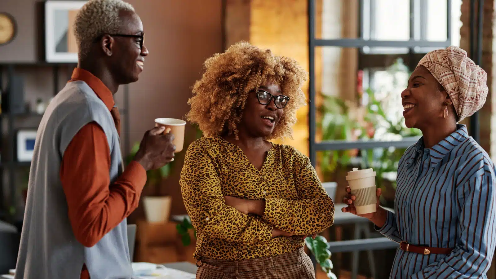 A group of coworkers having a conversation.