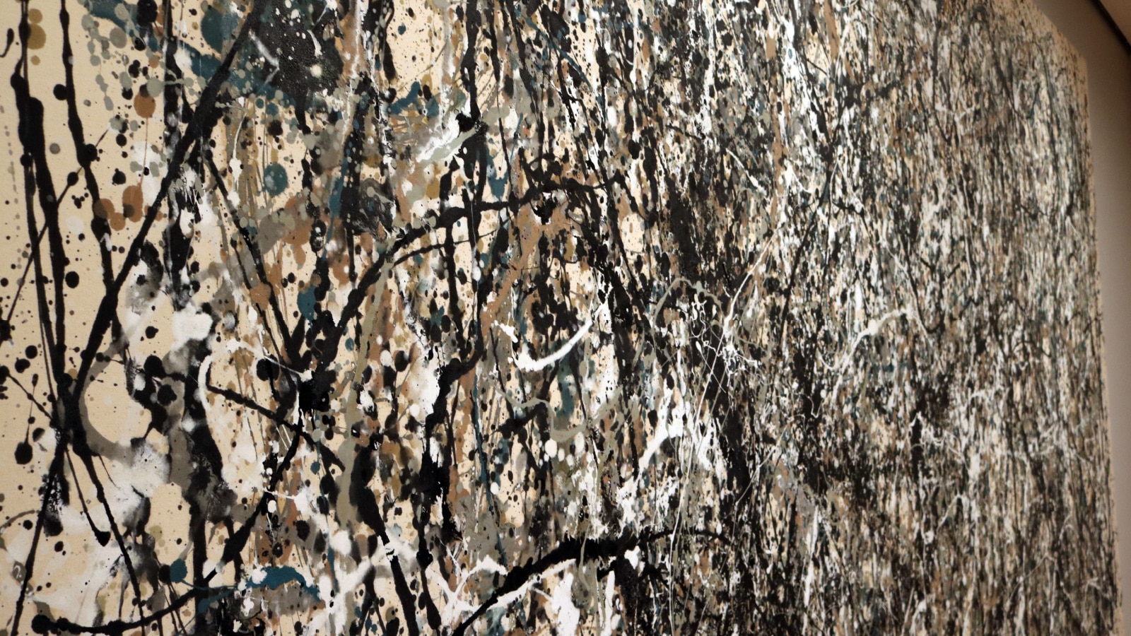 Close up of a Jackson Pollock drip painting.
