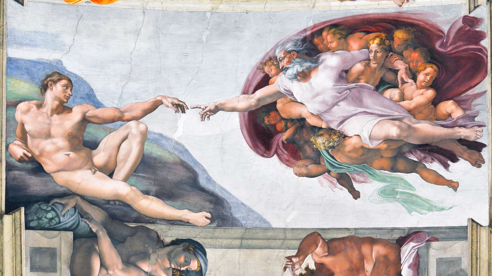 Michelangelo's famous artwork Creation of Adam on the ceiling of the Sistine Chapel in Rome.