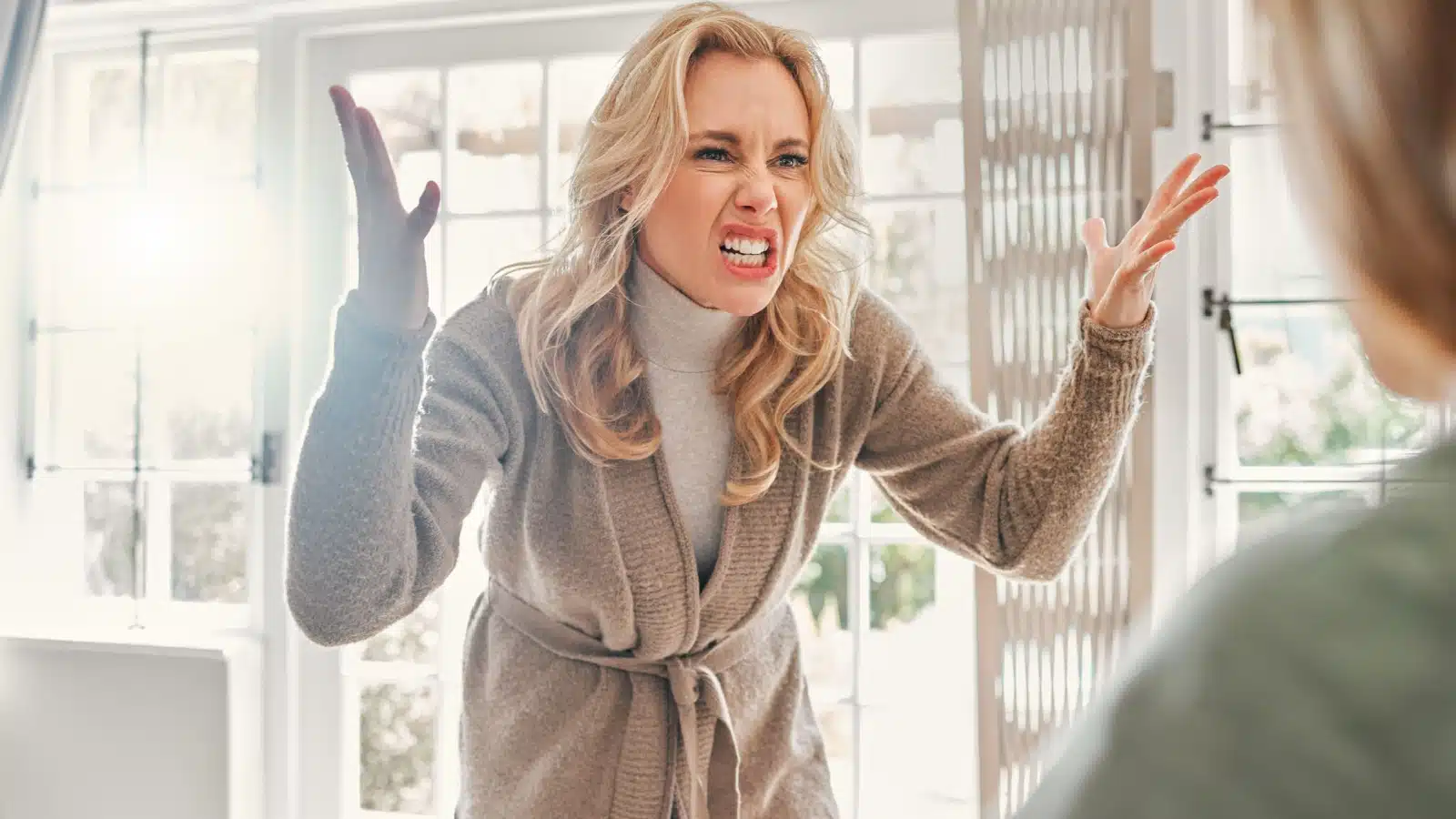 An angry woman yelling to represent the minor inconveniences that make us rage.