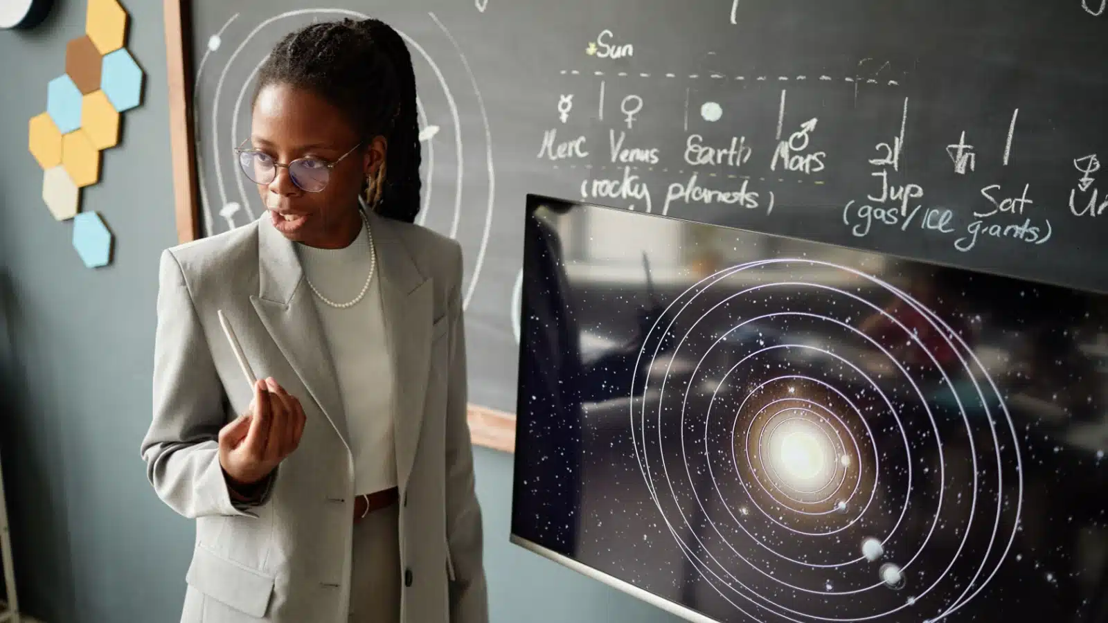 A woman teaches astronomy.