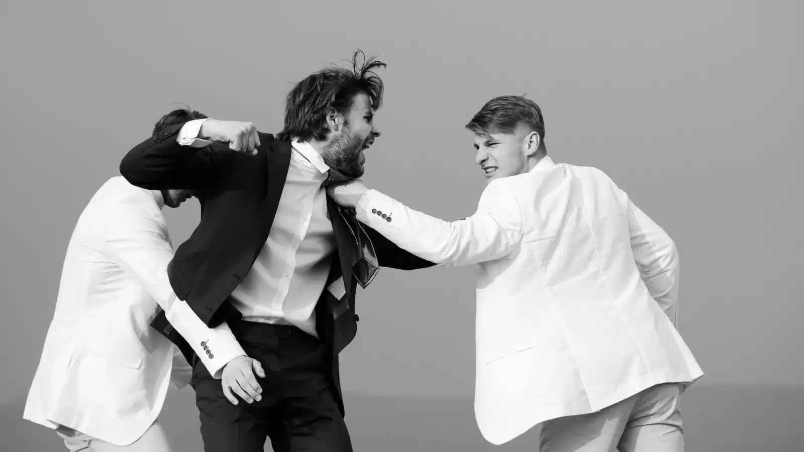 A man starts a fight at a wedding, ruining the event.