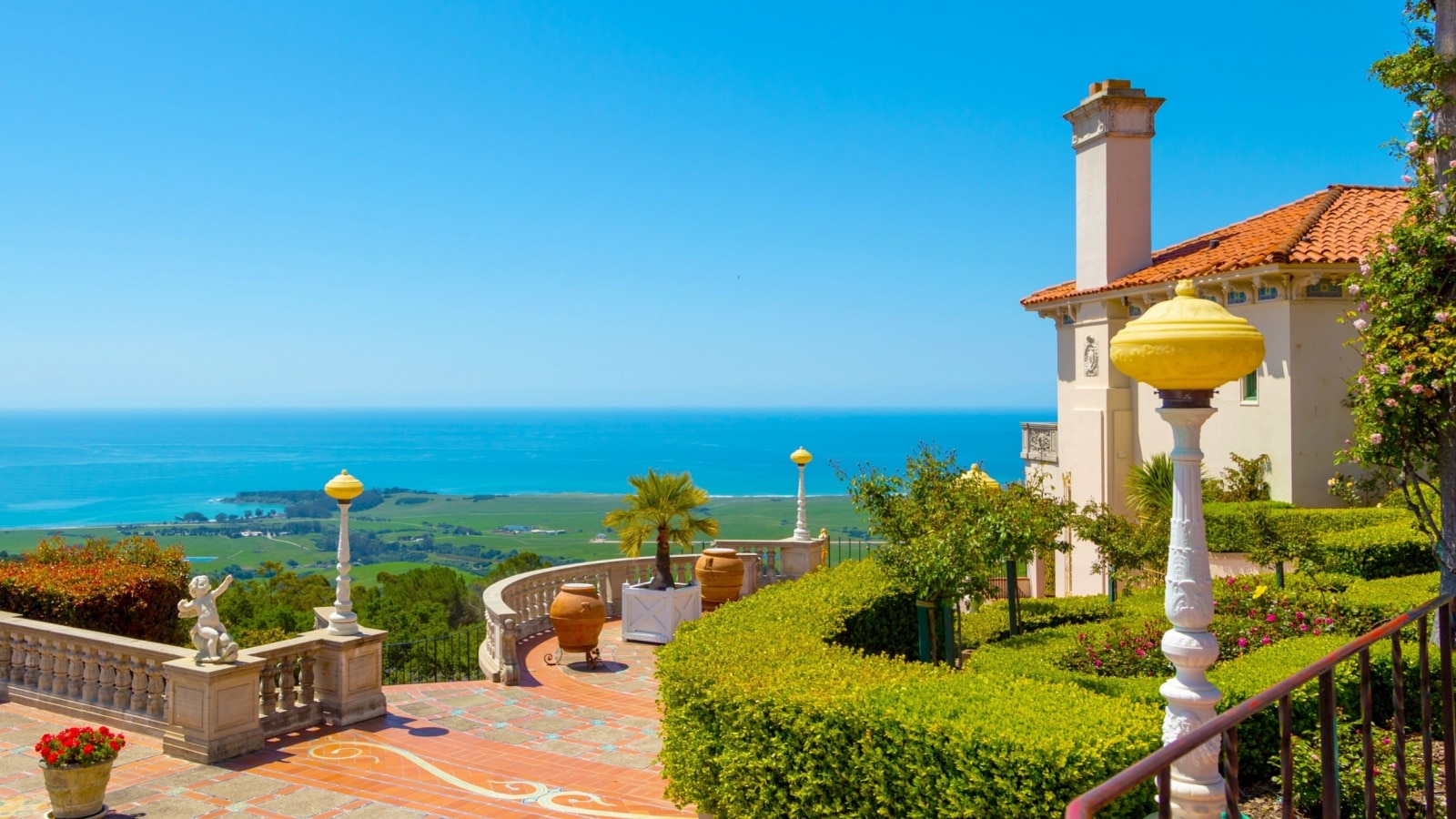 The courtyard at Hearst Castle in San Simeon looking out into the Ocean. Hearst Castle is one of the best things to do in California. 