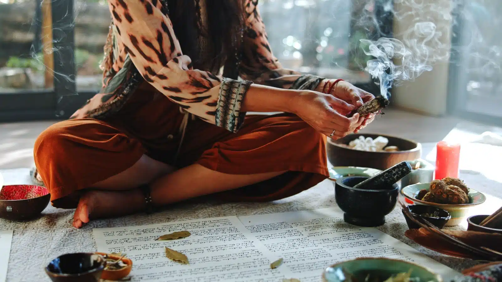 A modern witch performs a purification ritual to celebrate Hecate's Night.
