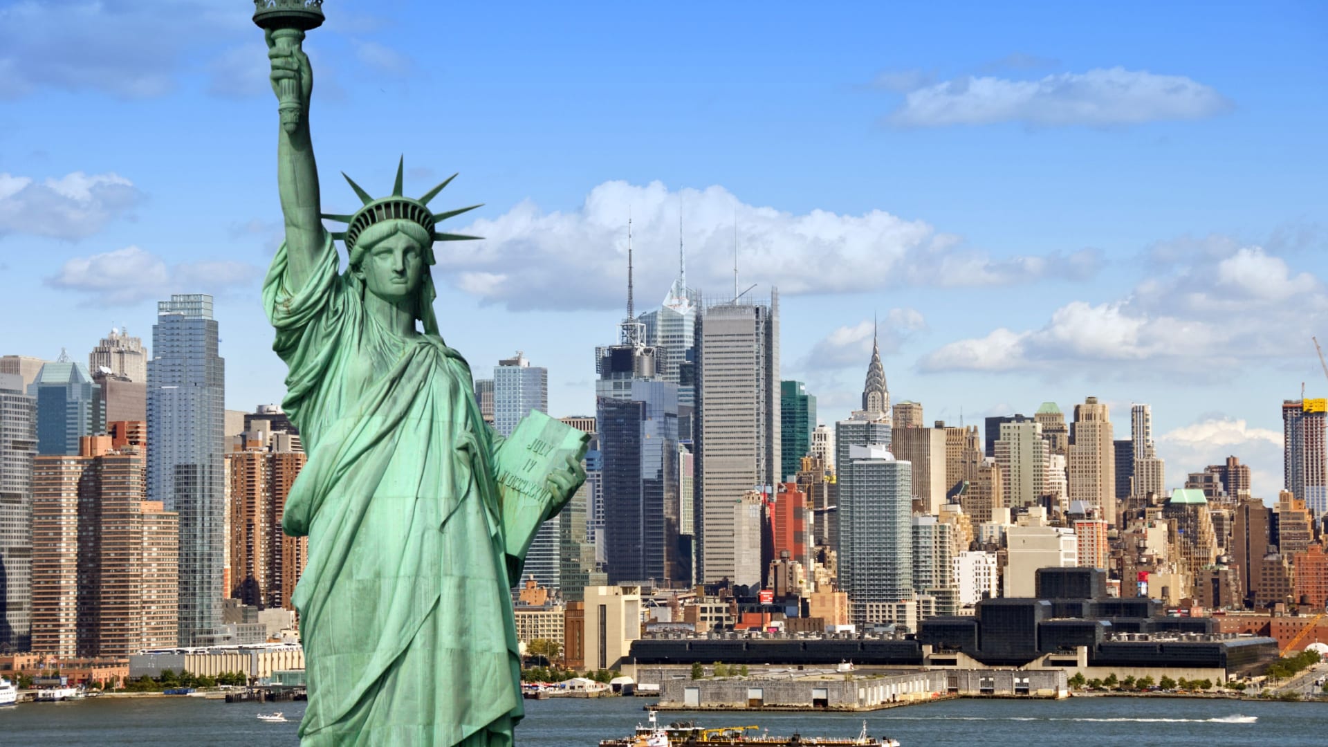 image of New York Skyline with statue of Liberty in front