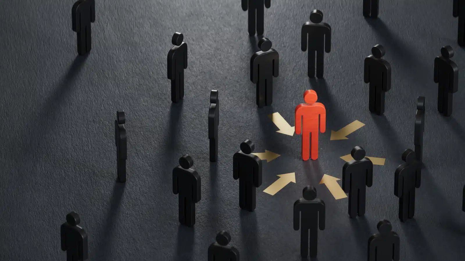 3D illustration showing wooden blocks representing humans. One is red, to represent the empath, and the others are black. Arrows point from the black figures to the red, showcasing how the red one is picking up on their energies, to represent signs of an empath.