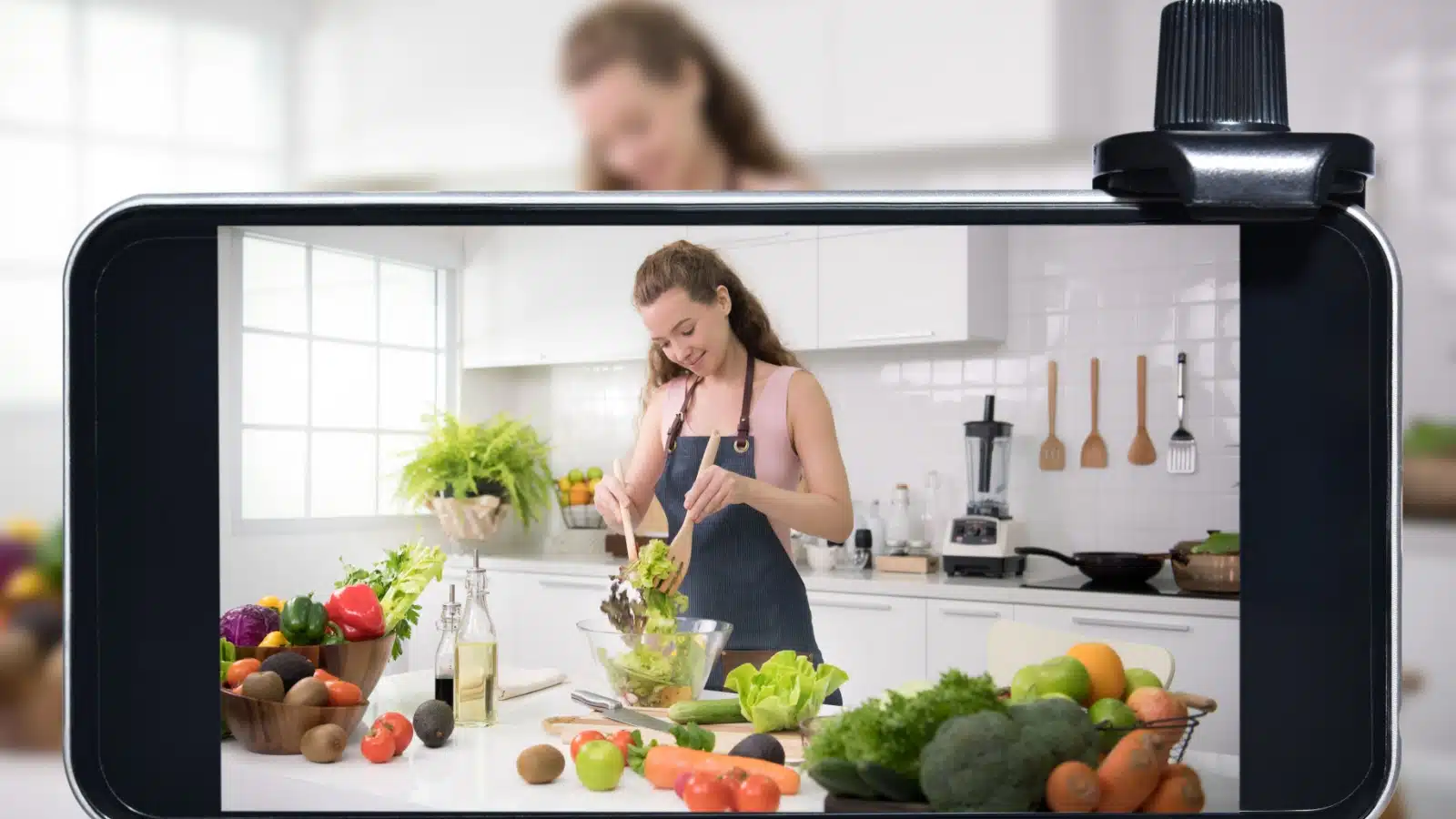 A woman makes a cooking video.