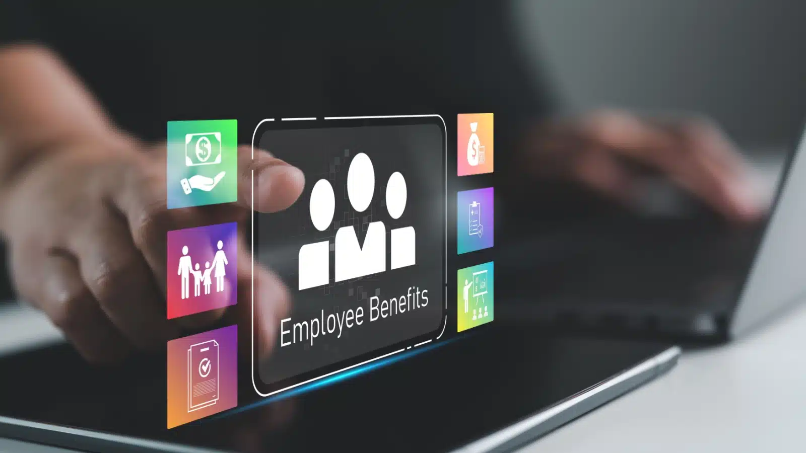 A tablet brings up a touch screen image of an employee benefits landing page.