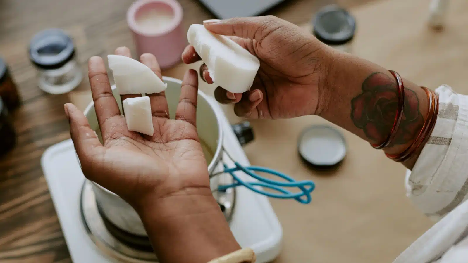 Hands crafting homemade soap.