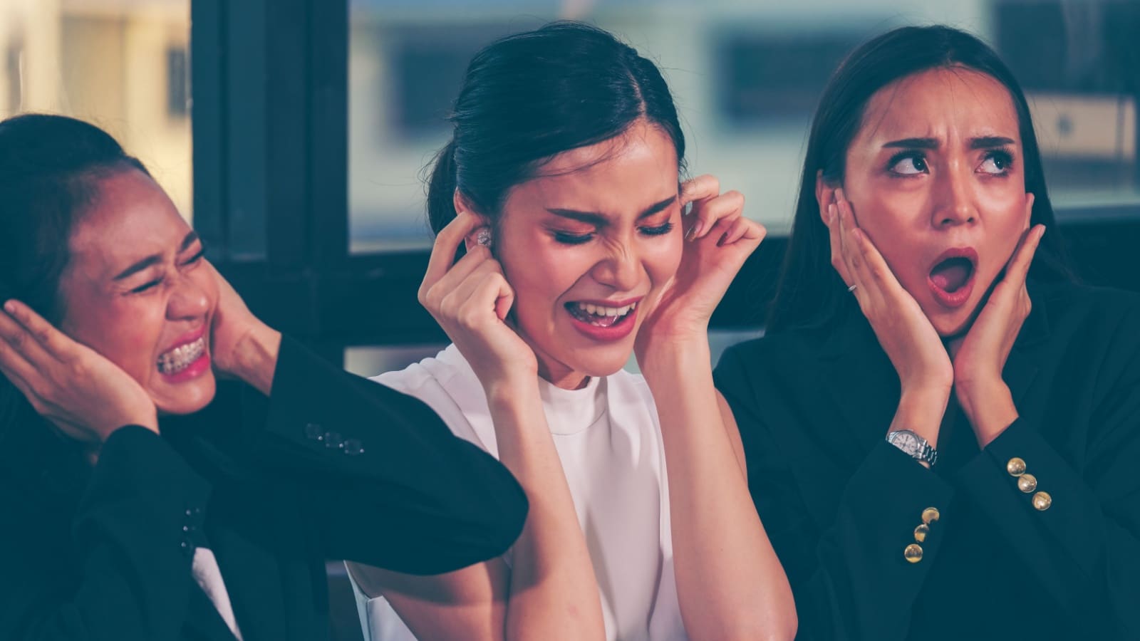 Women plugging their ears to ignore the messed up things society allows.