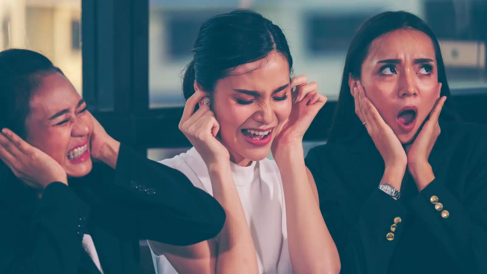 Women plugging their ears to ignore the messed up things society allows.