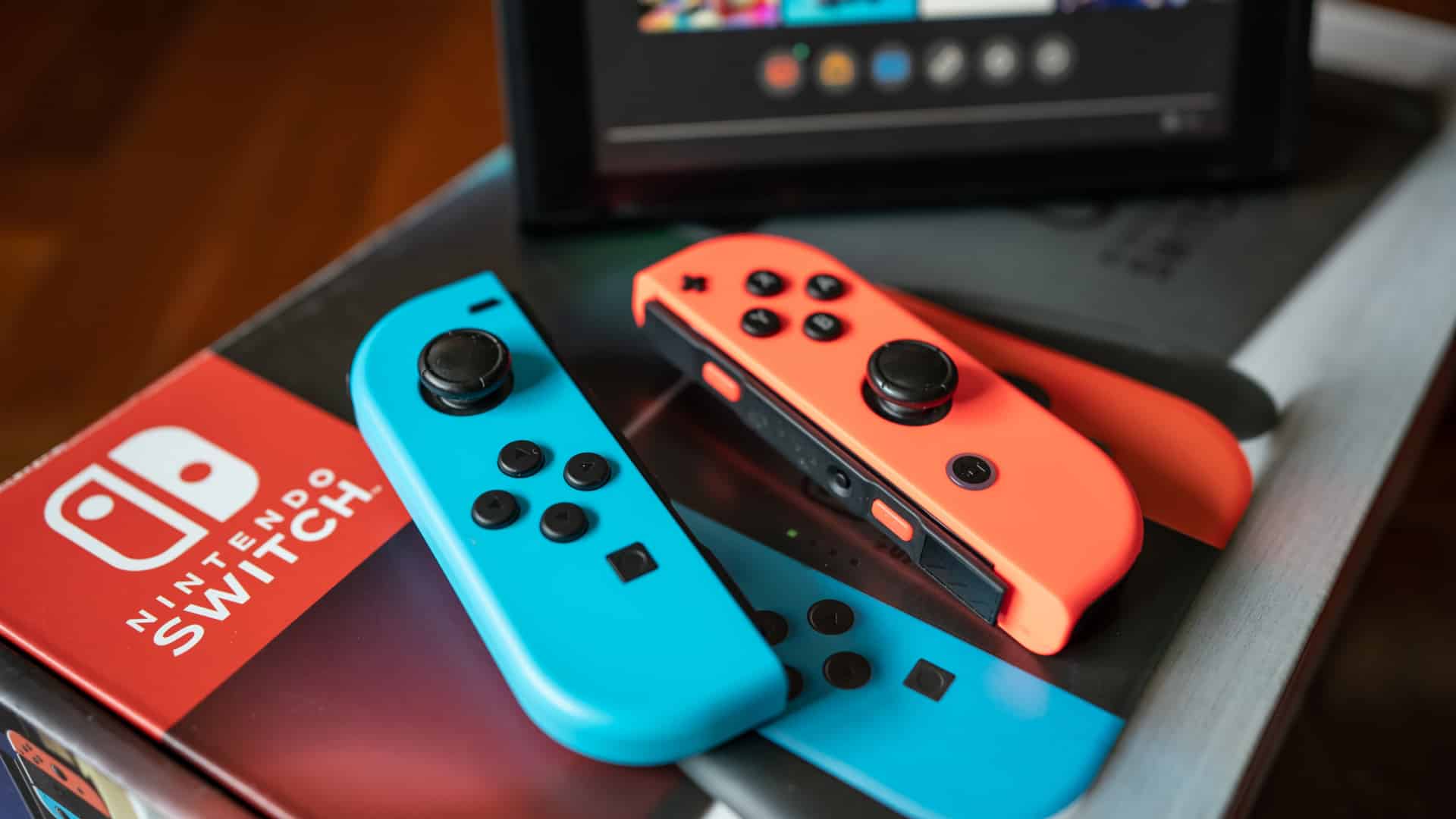 Nintendo switch joycon controllers on a Nintendo Switch Box.
