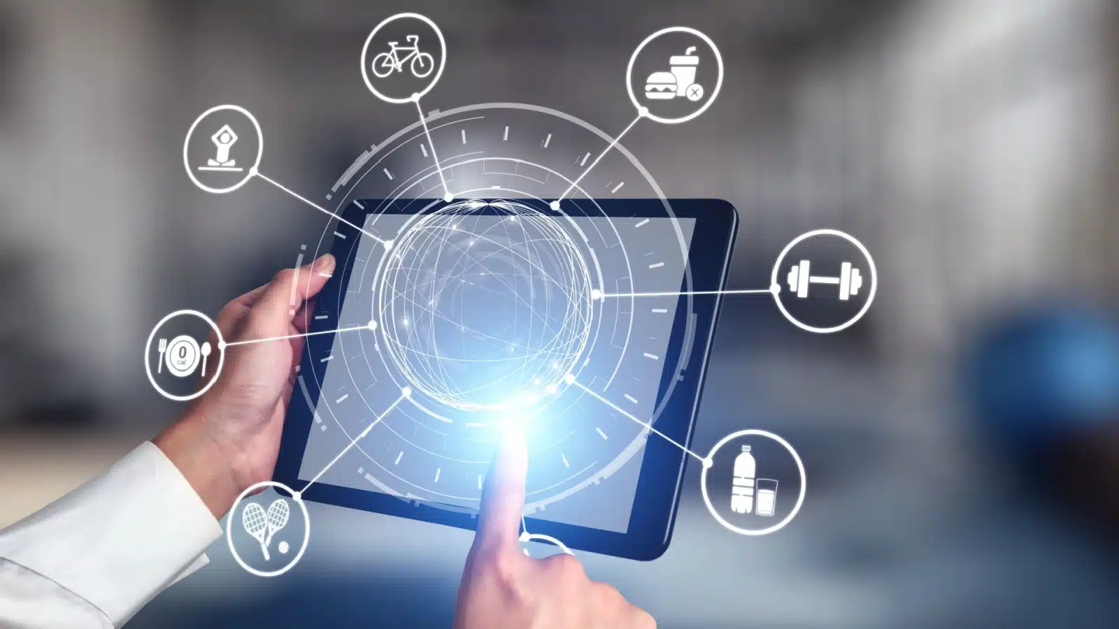 A person uses a tablet to track their habits.