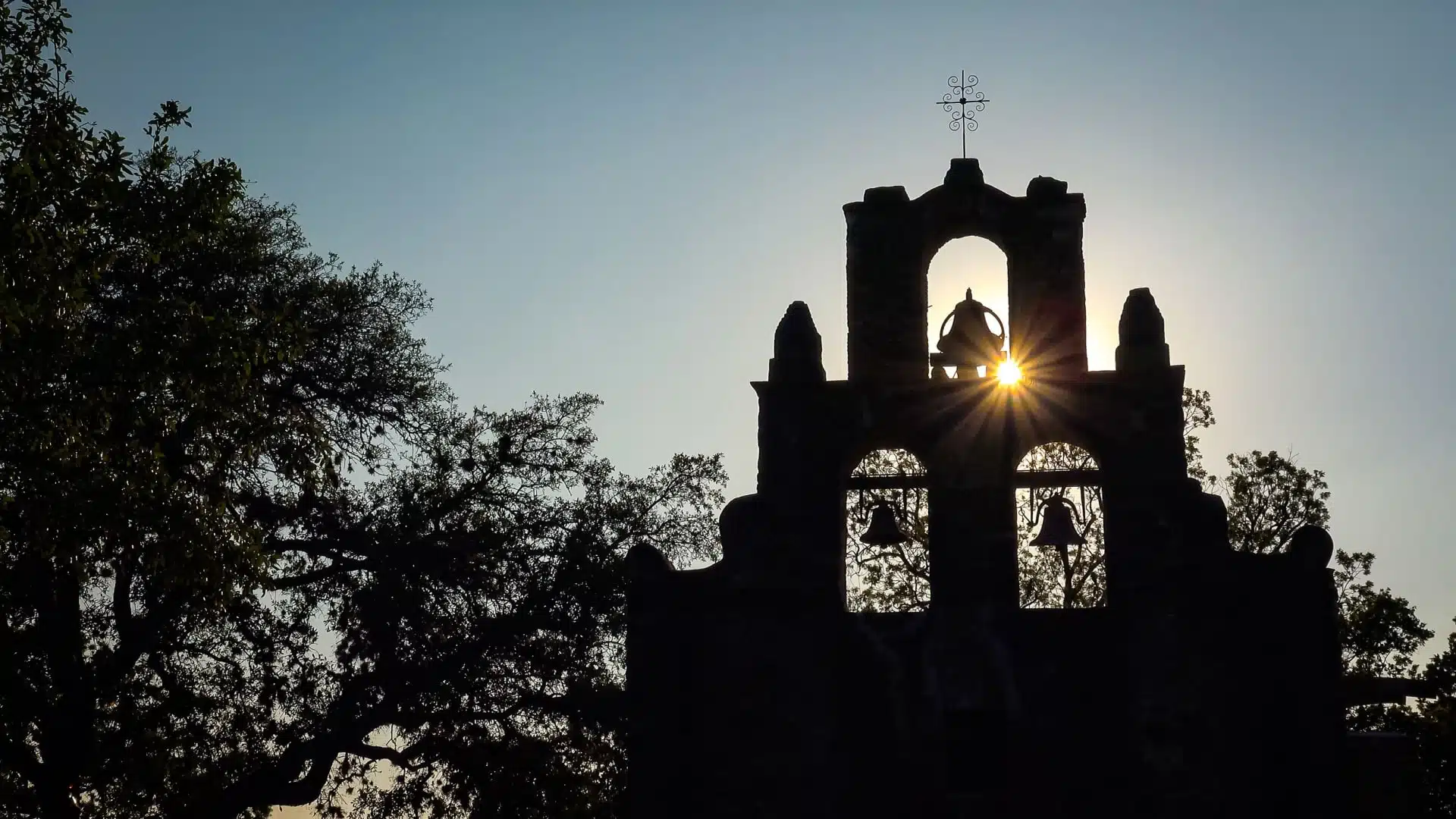Silhouette of Spanish Mission as the sun goes down