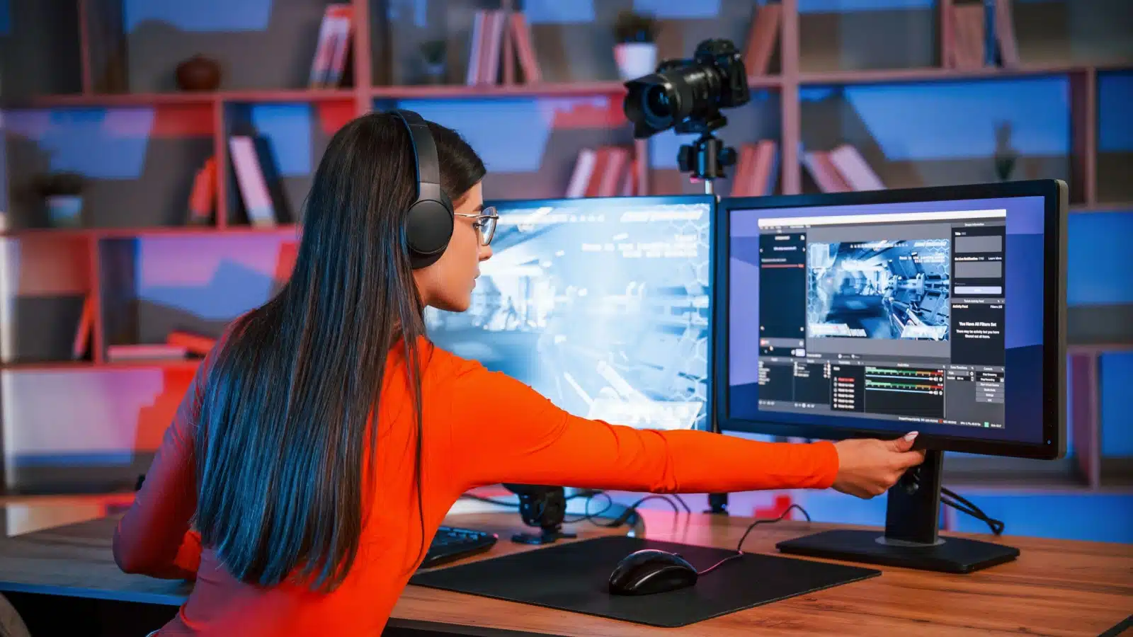 A streamer sets up her tech while getting ready to go live on Twitch.