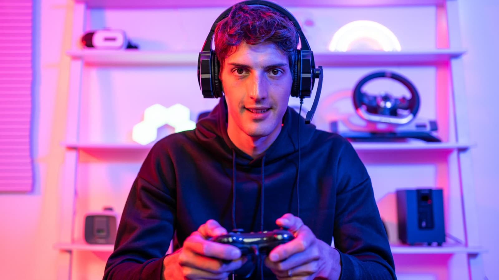 Portrait of a streamer playing a video game with a controller.