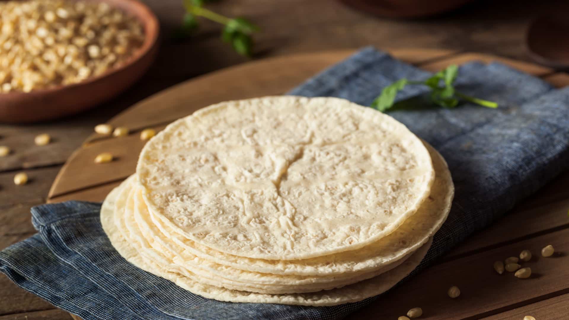 A stack of corn tortillas to represent soft taco shells.