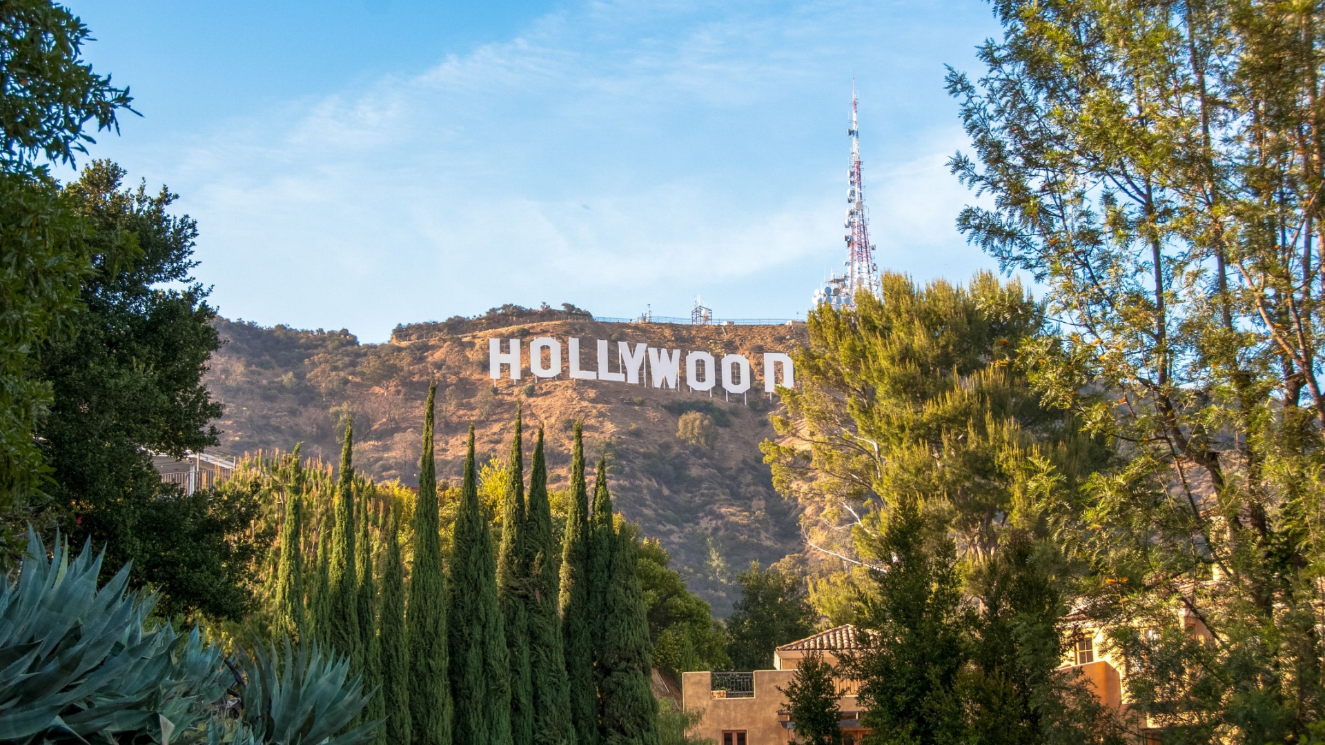 The iconic Hollywood sign on a mountain.