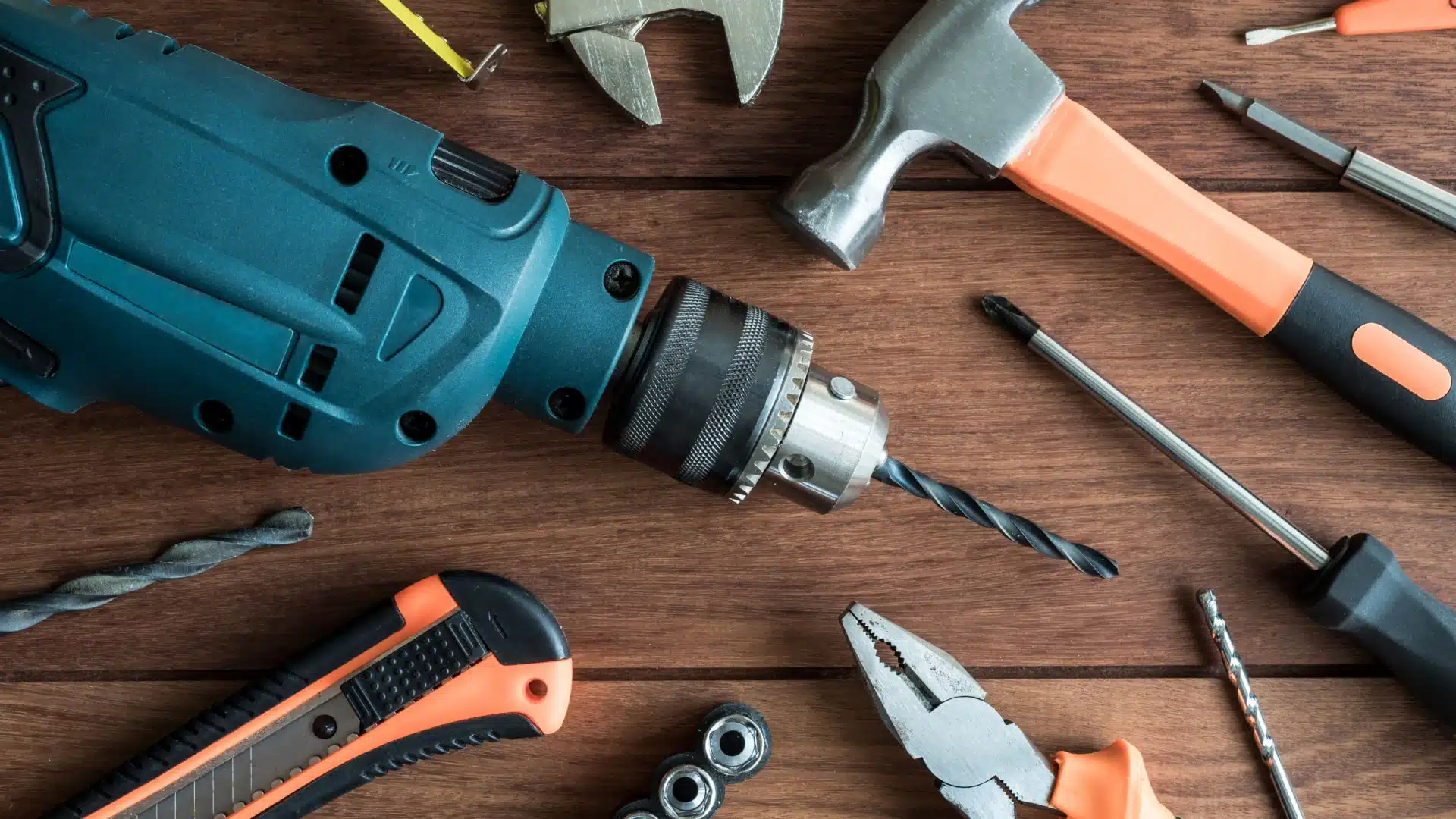 Close-up of an assortment of work tools on the bench.