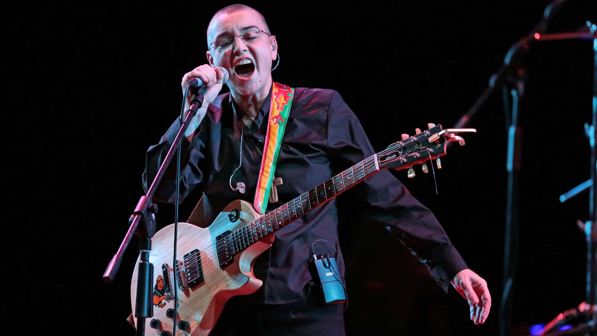 Sinéad O’Connor singing.